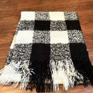Black and white checked scarf with fringe